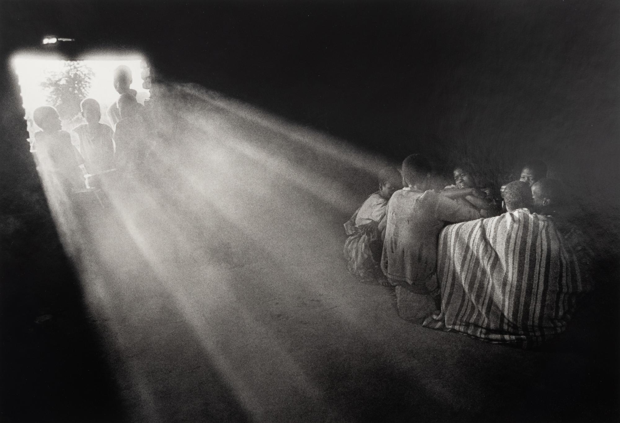 Sebastião Salgado (born 1944) Boys fleeing from southern Sudan to avoid being forced to fight in the civil war, heading for the refugee camps of northern Kenya, Southern Sudan, 1993