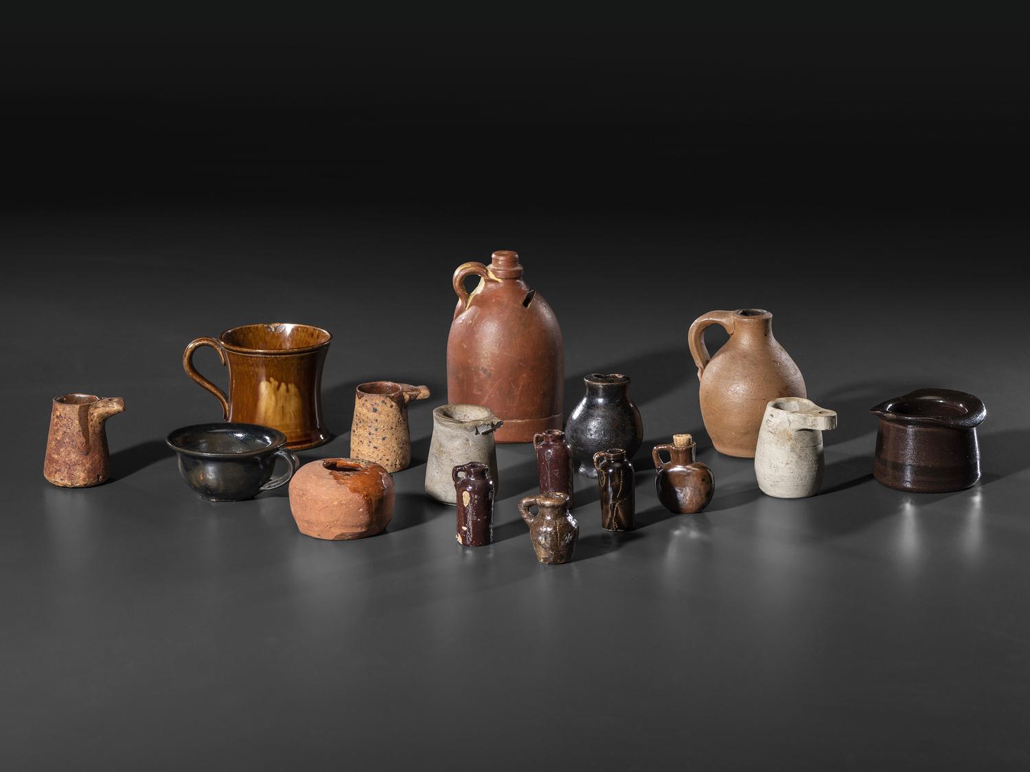 Sixteen Miniature Stoneware and Redware Vessels
