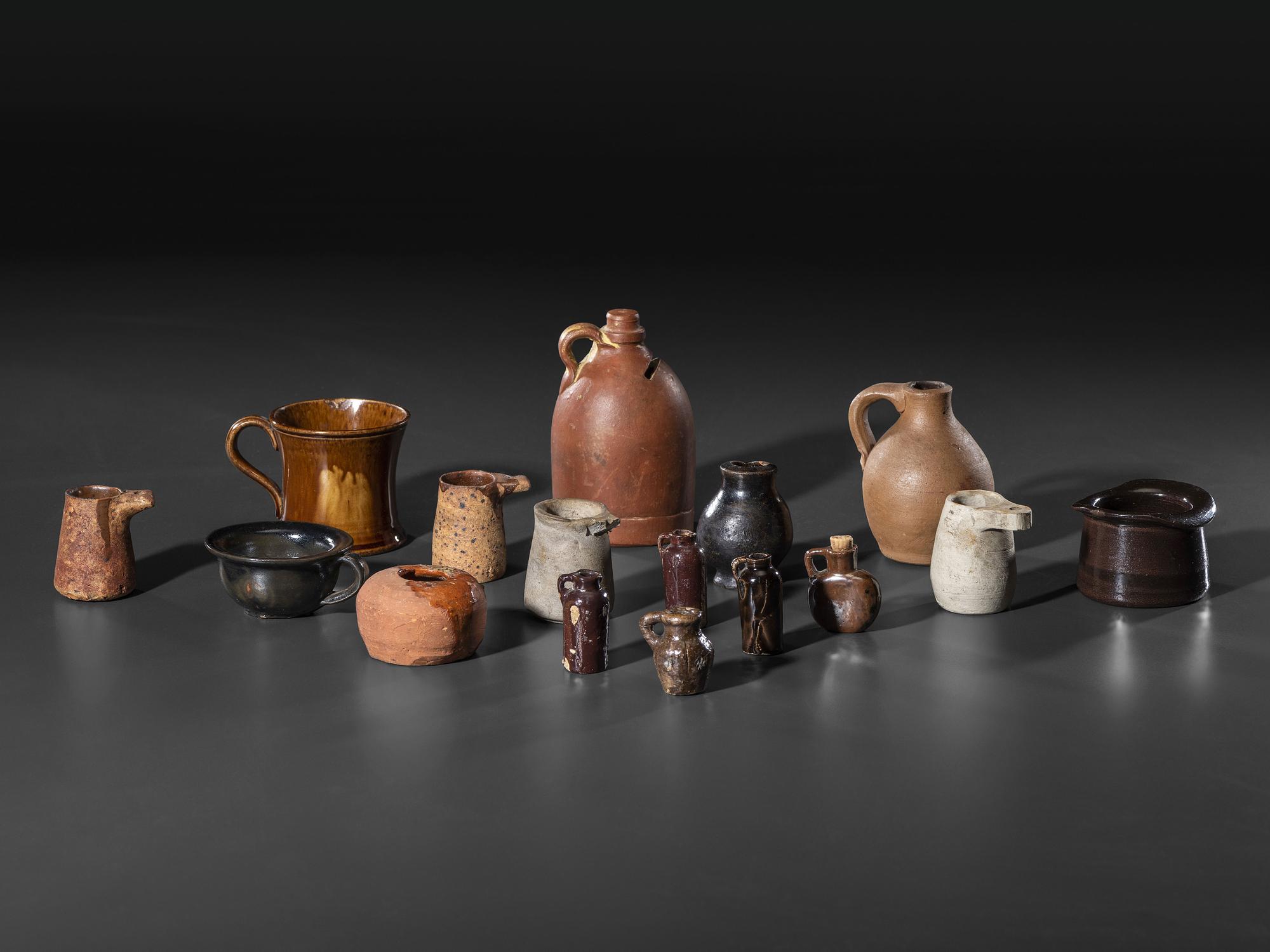 Sixteen Miniature Stoneware and Redware Vessels