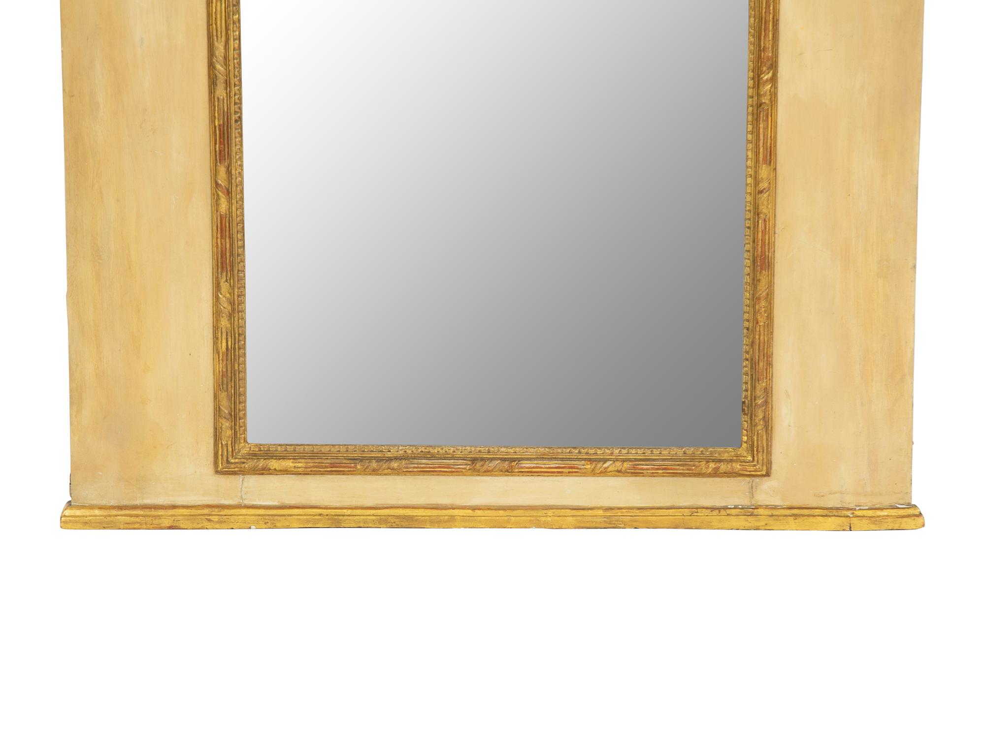 An Italian Painted and Carved Giltwood Trumeau Mirror