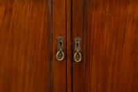 A Mahogany Fitted Gentleman's Wardrobe — EARLY 20TH CENTURY