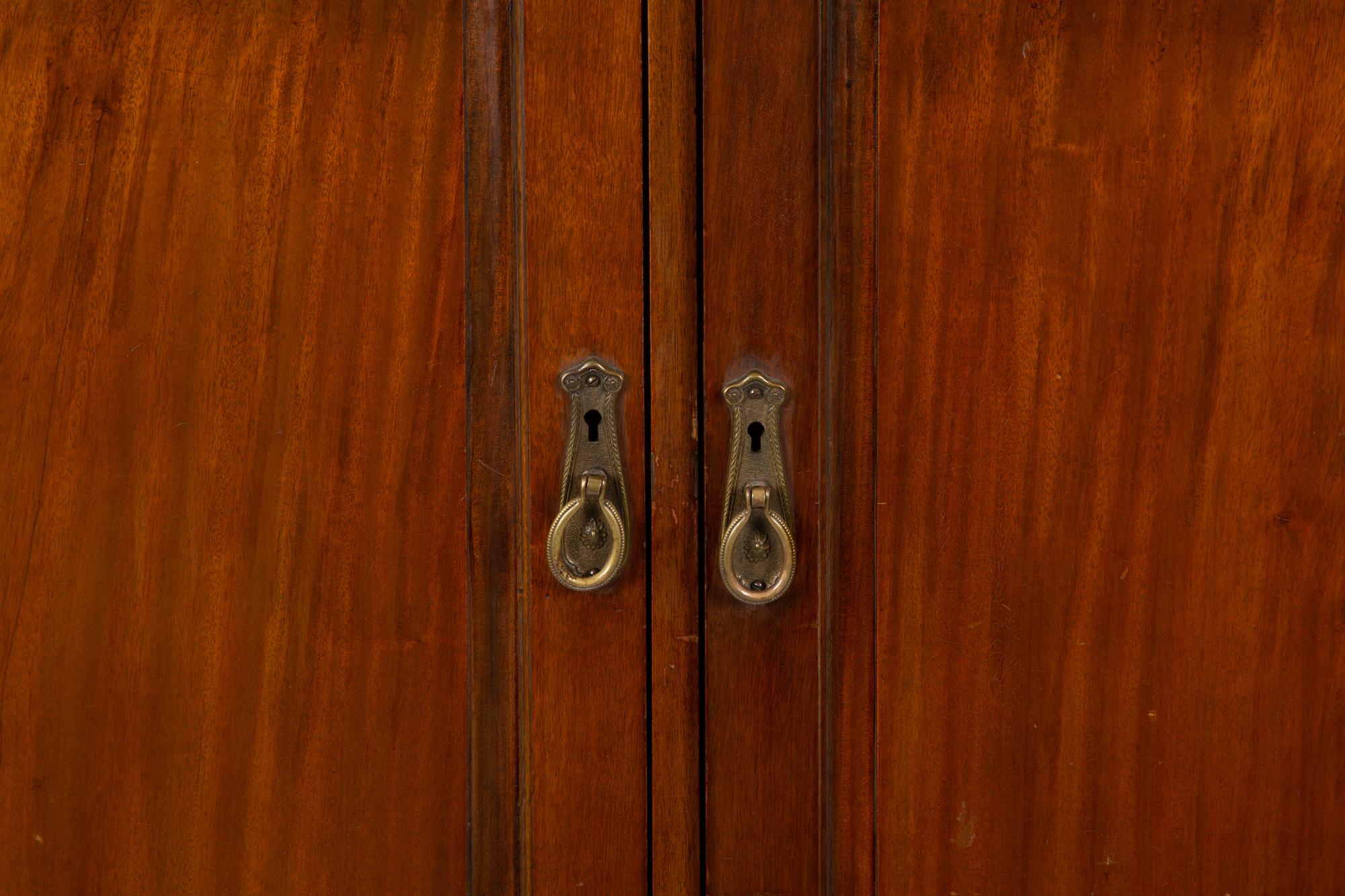 A Mahogany Fitted Gentleman's Wardrobe — EARLY 20TH CENTURY