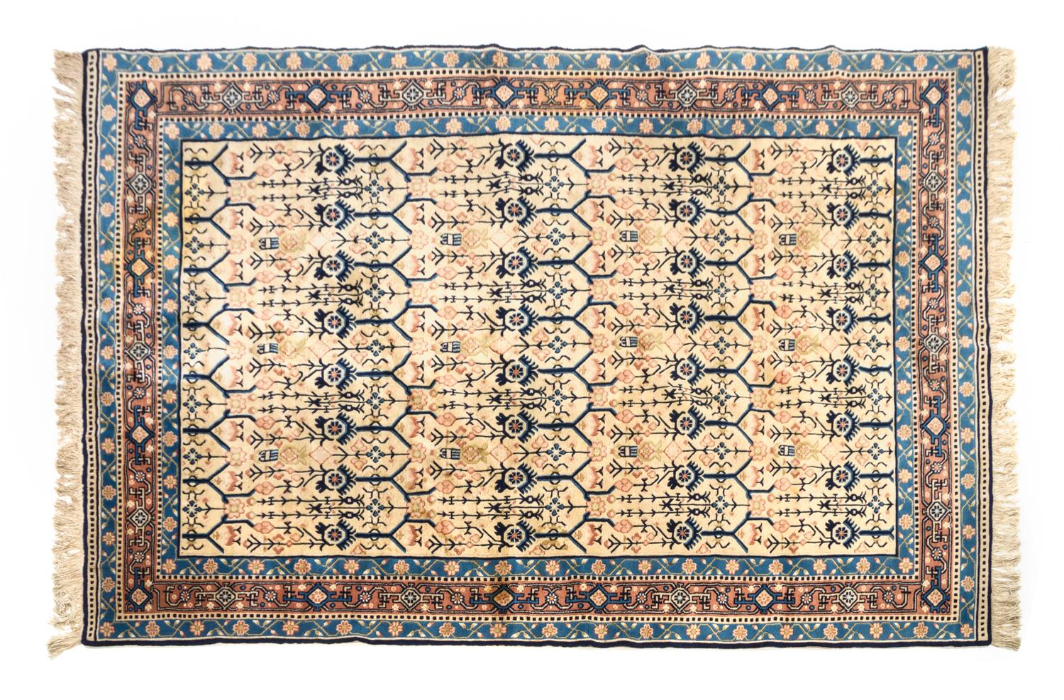 A Chinese Silk and Wool Rug 9 feet 1 inch x 5 feet 10 1/2 inches.