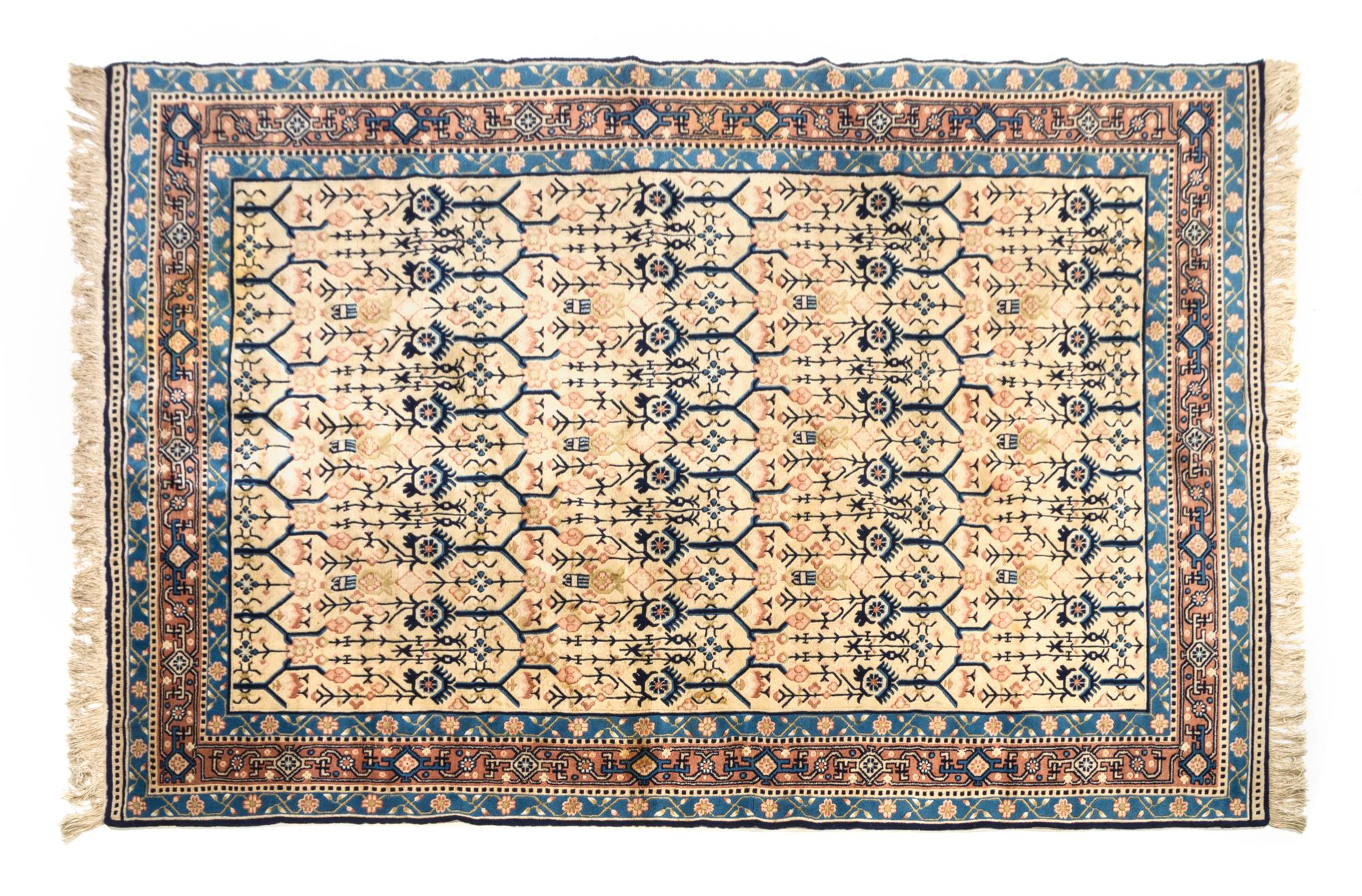 A Chinese Silk and Wool Rug 9 feet 1 inch x 5 feet 10 1/2 inches.