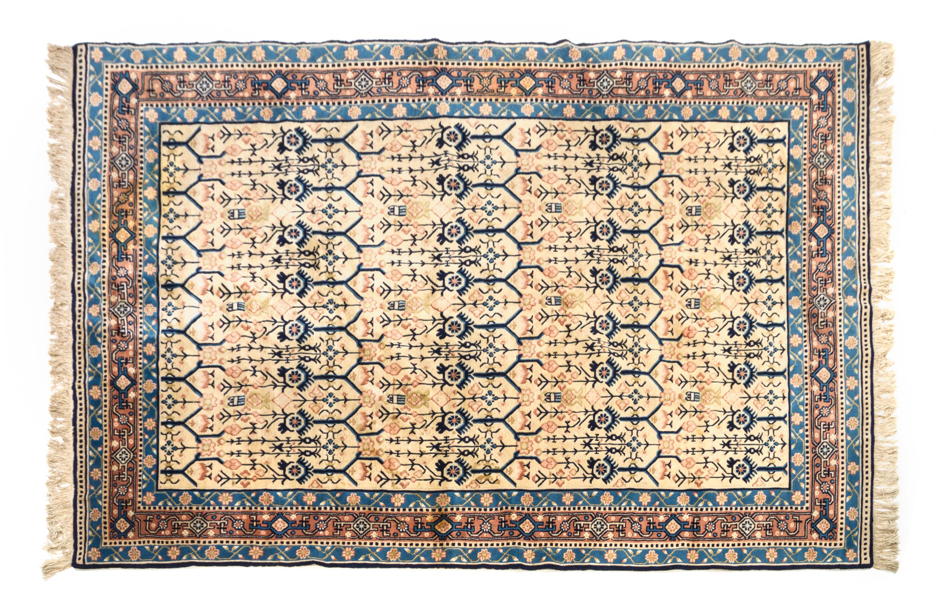 A Chinese Silk and Wool Rug 9 feet 1 inch x 5 feet 10 1/2 inches.