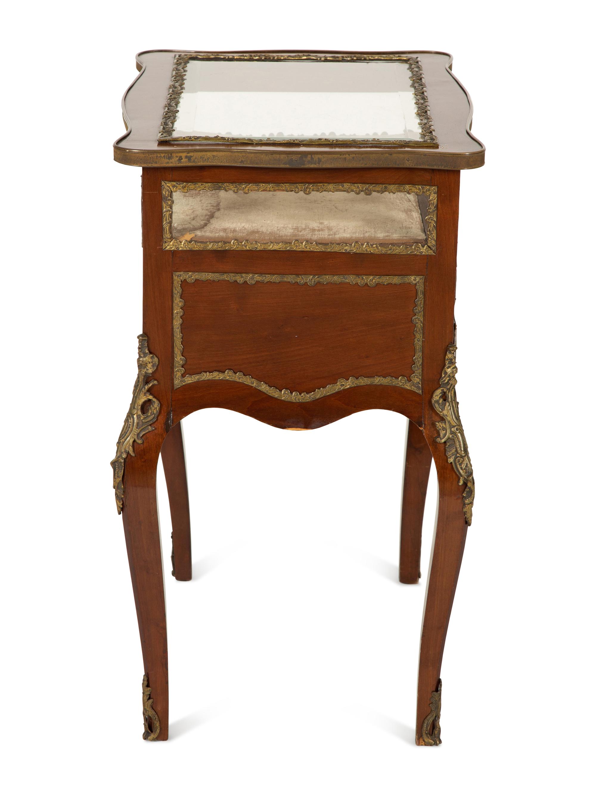 A Louis XV Style Gilt Bronze Mounted Mahogany Vitrine Table