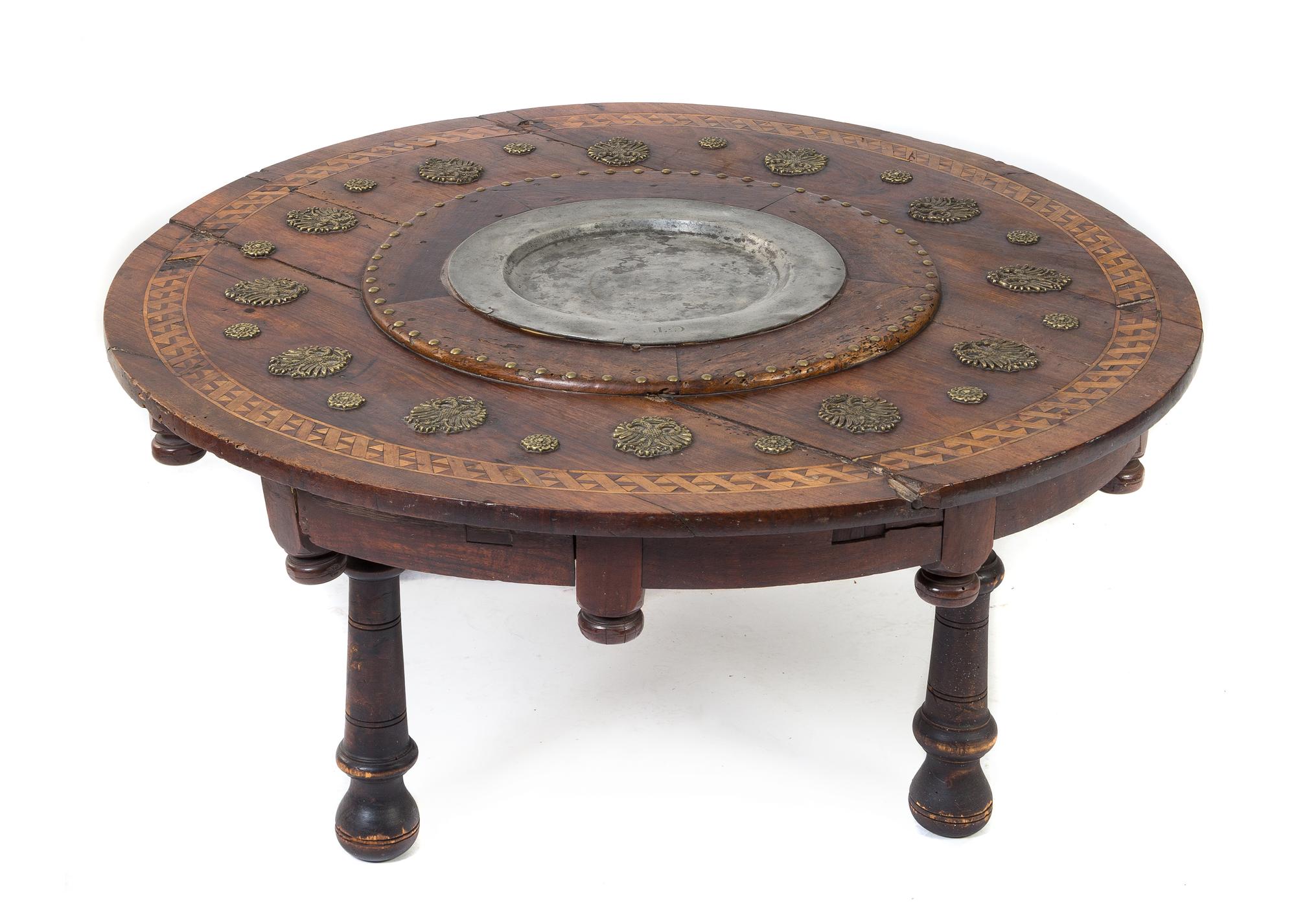 A Continental Parquetry Brazier Converted to a Low Table Diameter 38 inches.