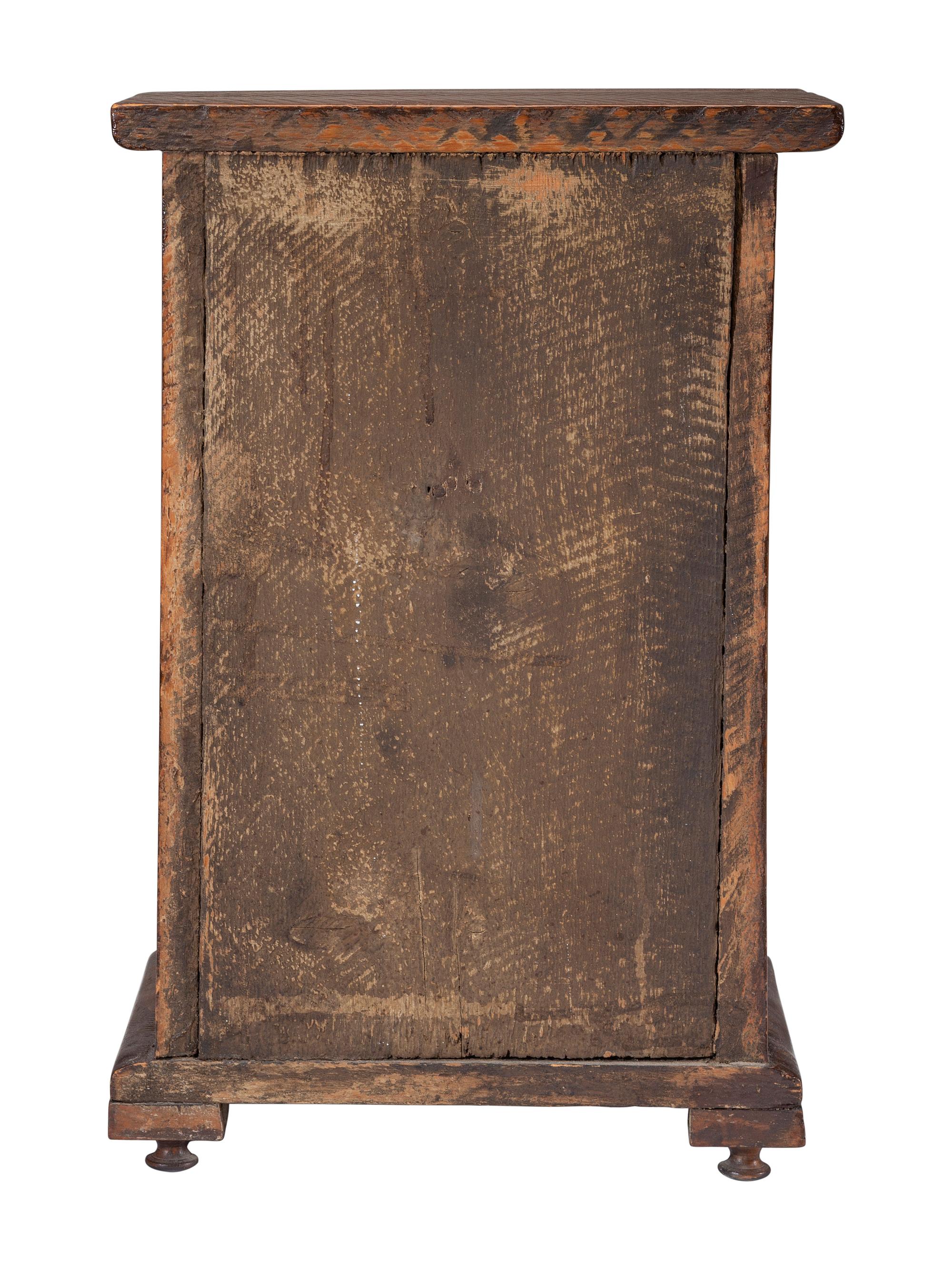 A Georgian Miniature Oak Chest of Drawers