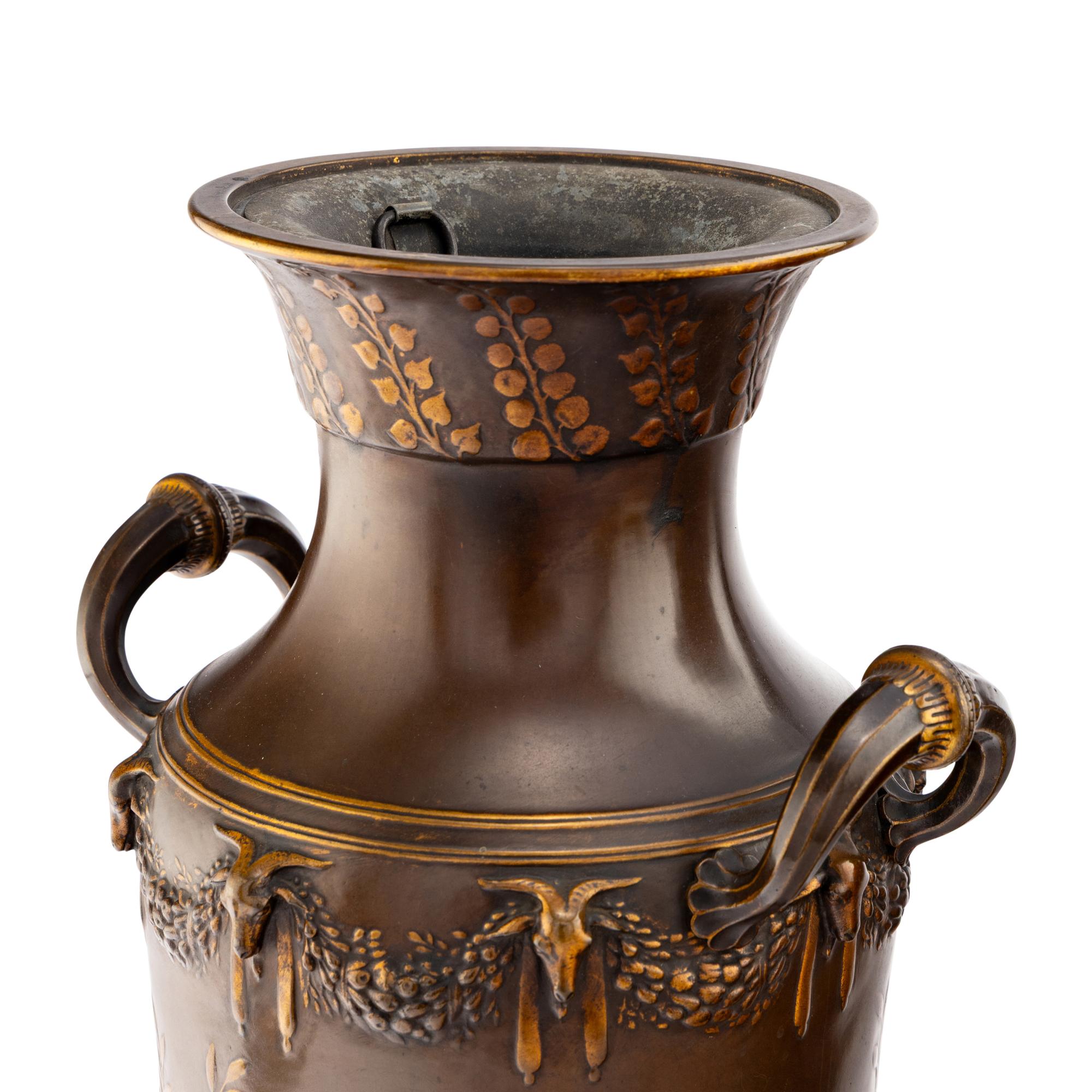 A Pair of Neoclassical Patinated and Parcel Gilt Bronze Vases