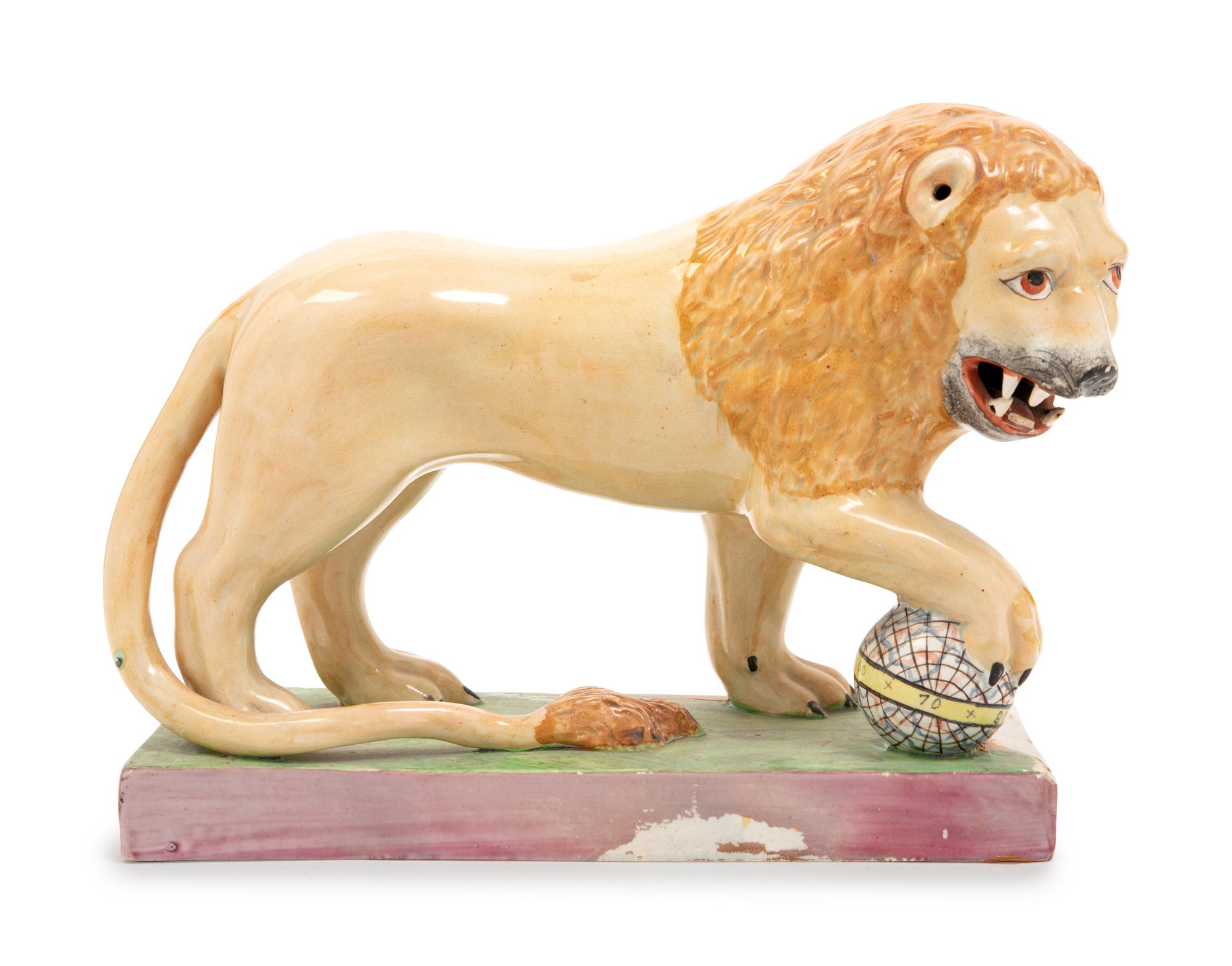 A Staffordshire Pottery Lion