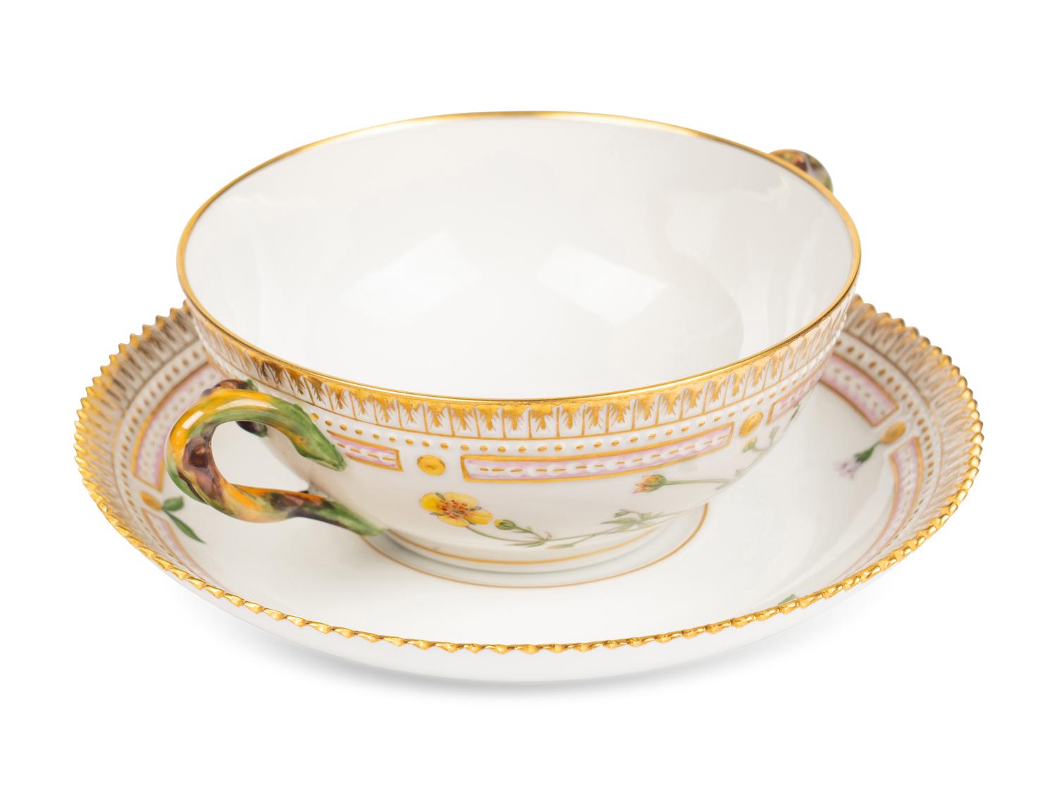 A Set of Twelve Royal Copenhagen Flora Danica Porcelain Bouillon Cups and Stands