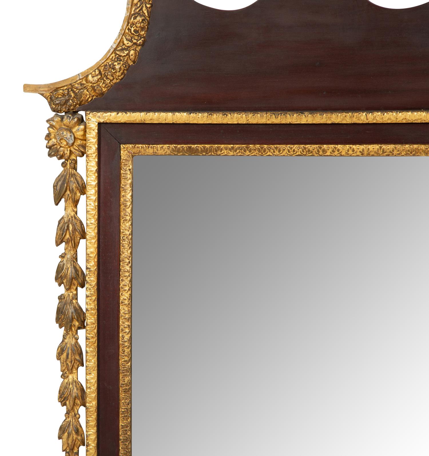 A George III Style Parcel Gilt Mahogany Mirror