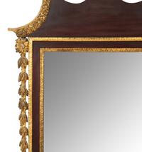 A George III Style Parcel Gilt Mahogany Mirror