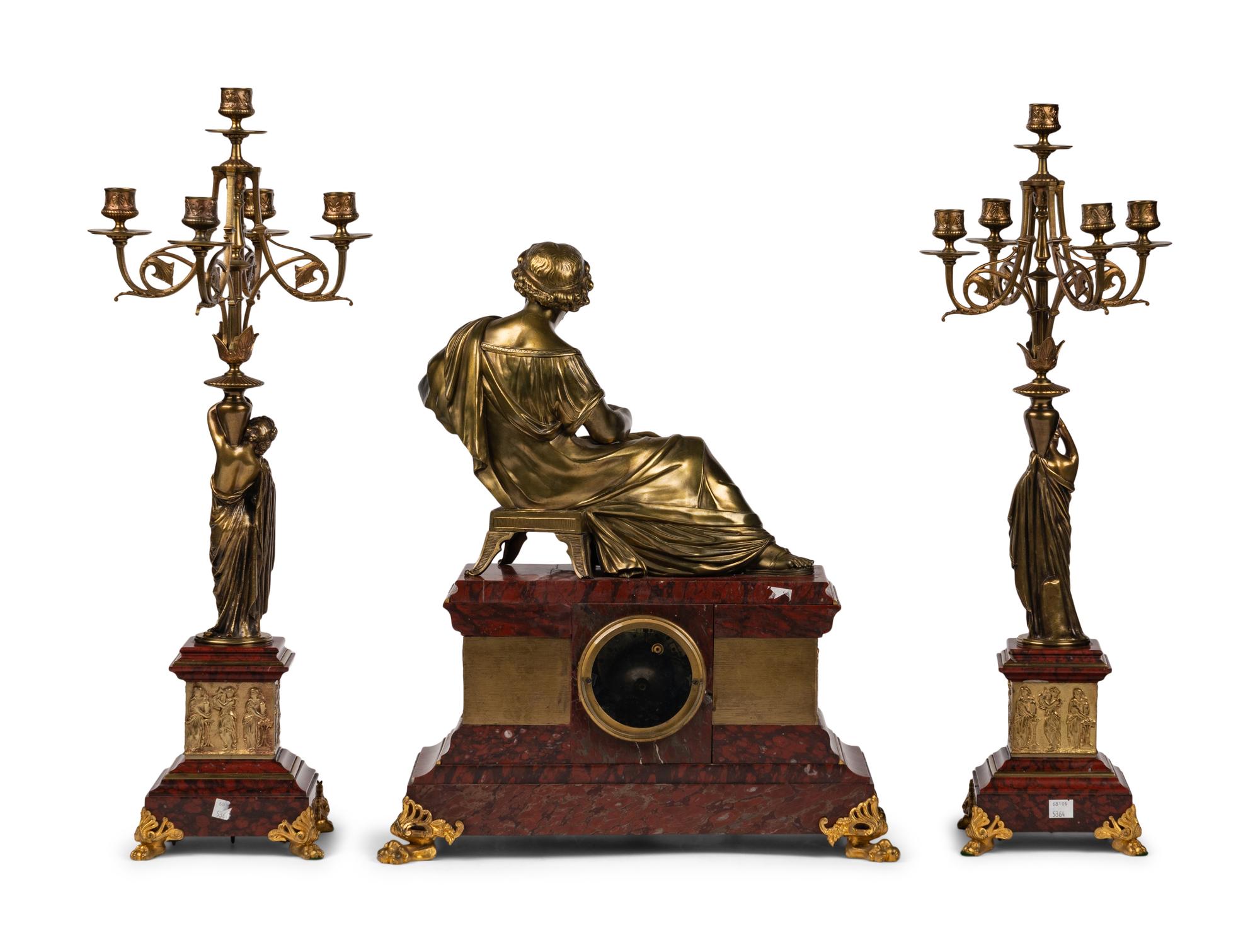 A French Neoclassical Gilt Bronze and Rouge Marble Clock Garniture