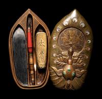 A Japanese Gold Lacquer Peacock-Form Writing Box