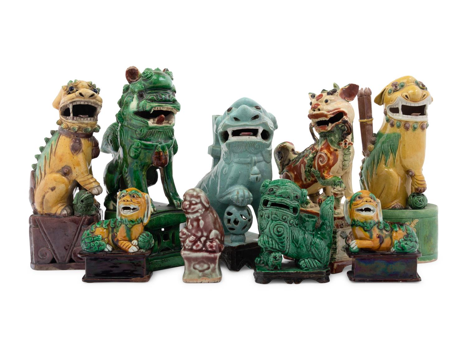 Nine Chinese Porcelain Figures of Fu Lions