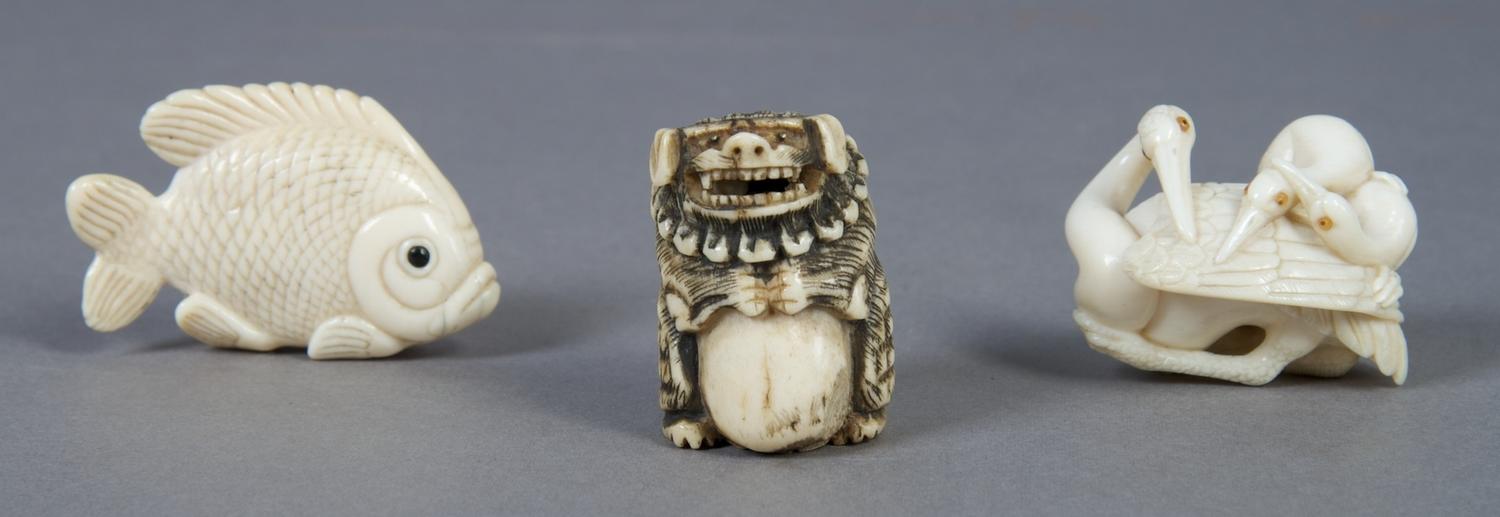 A Group of Three Japanese Netsuke, Height of tallest 1 1/2 inches.