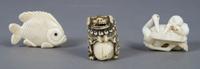 A Group of Three Japanese Netsuke, Height of tallest 1 1/2 inches.