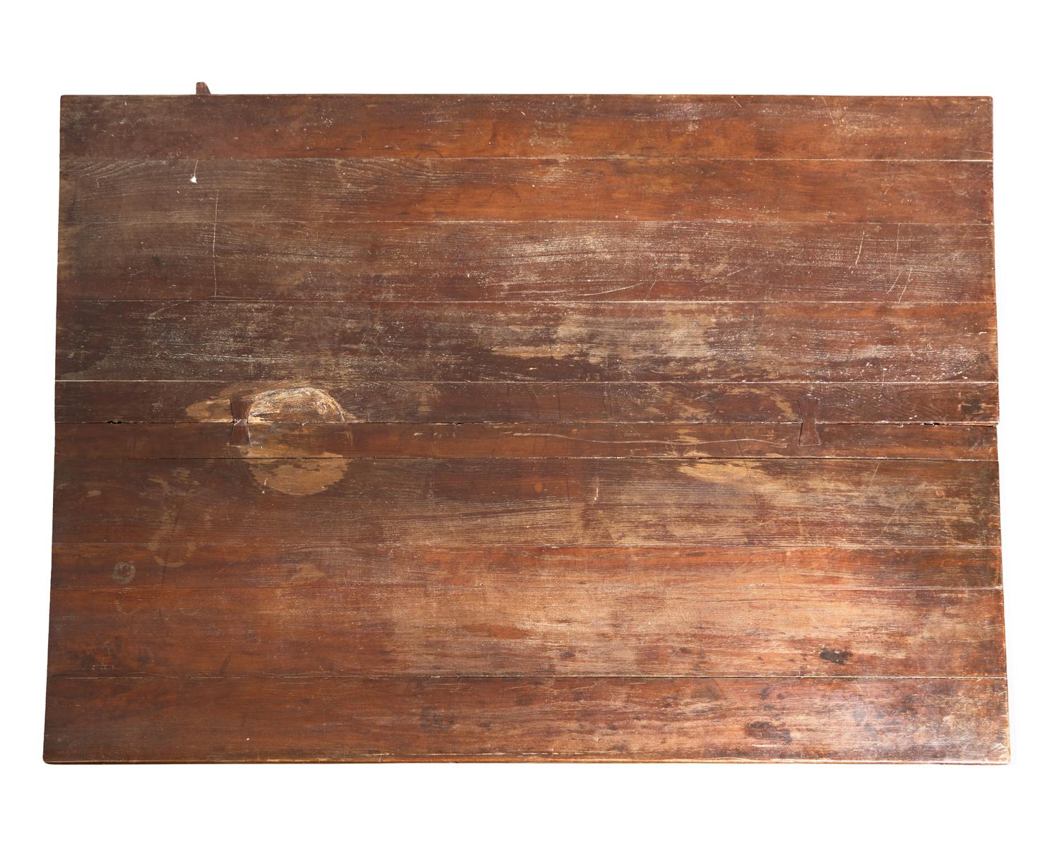 A Large Walnut Sawbuck Table