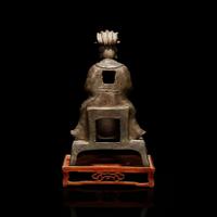 A Chinese bronze figure of a seated Daoist immortal with wood stand 道教仙人銅像與木底座 Ming dynasty ?