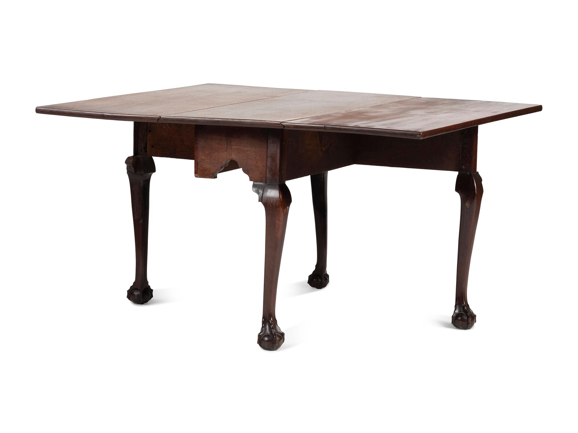 A Very Rare Pair of Chippendale Carved Walnut Claw-and-Ball Foot Drop-Leaf Dining Tables, 18th Century