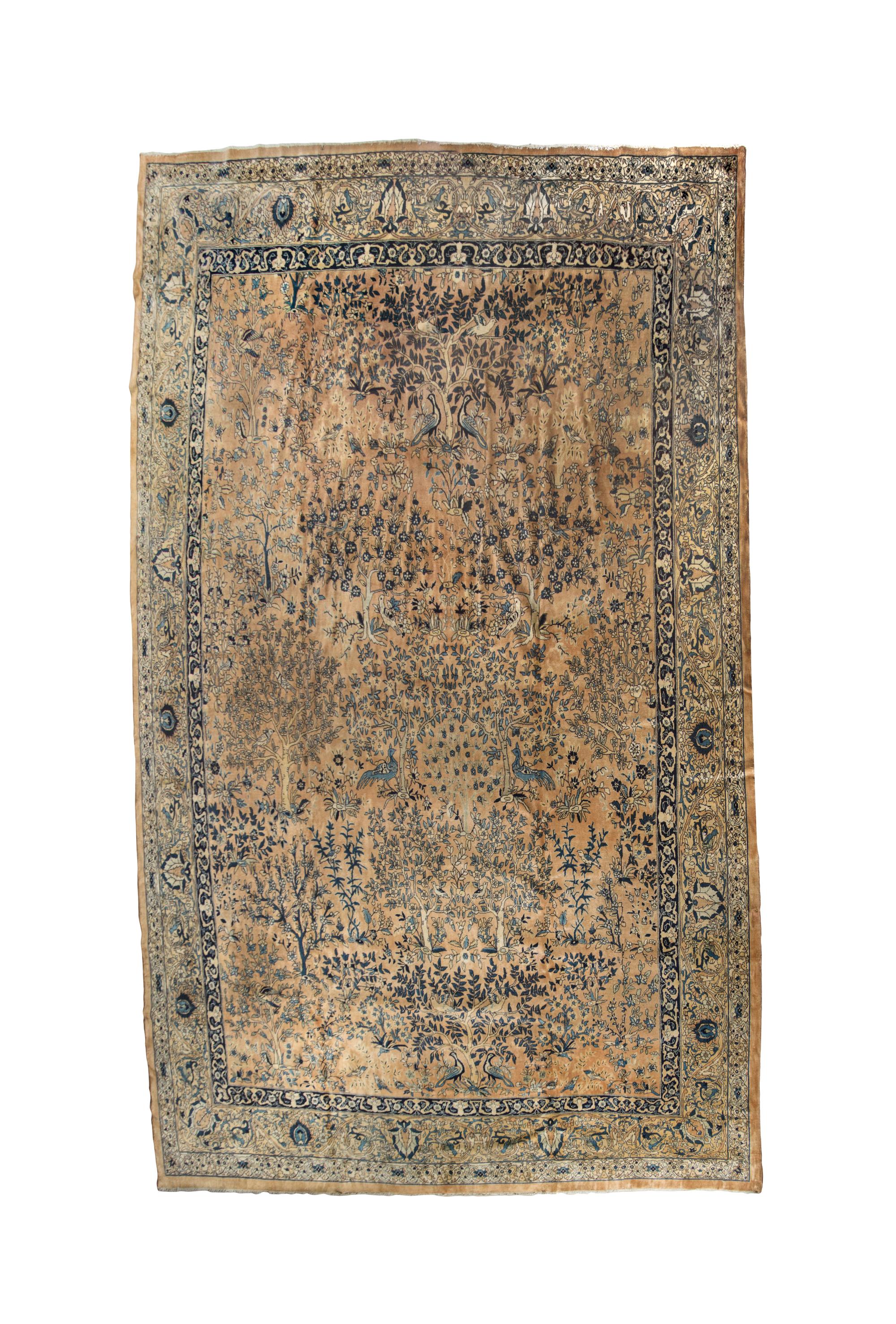 An Indian Wool Rug, CIRCA 1930S, 12 feet 5 inches x 16 feet 5 inches. — CIRCA 1930s