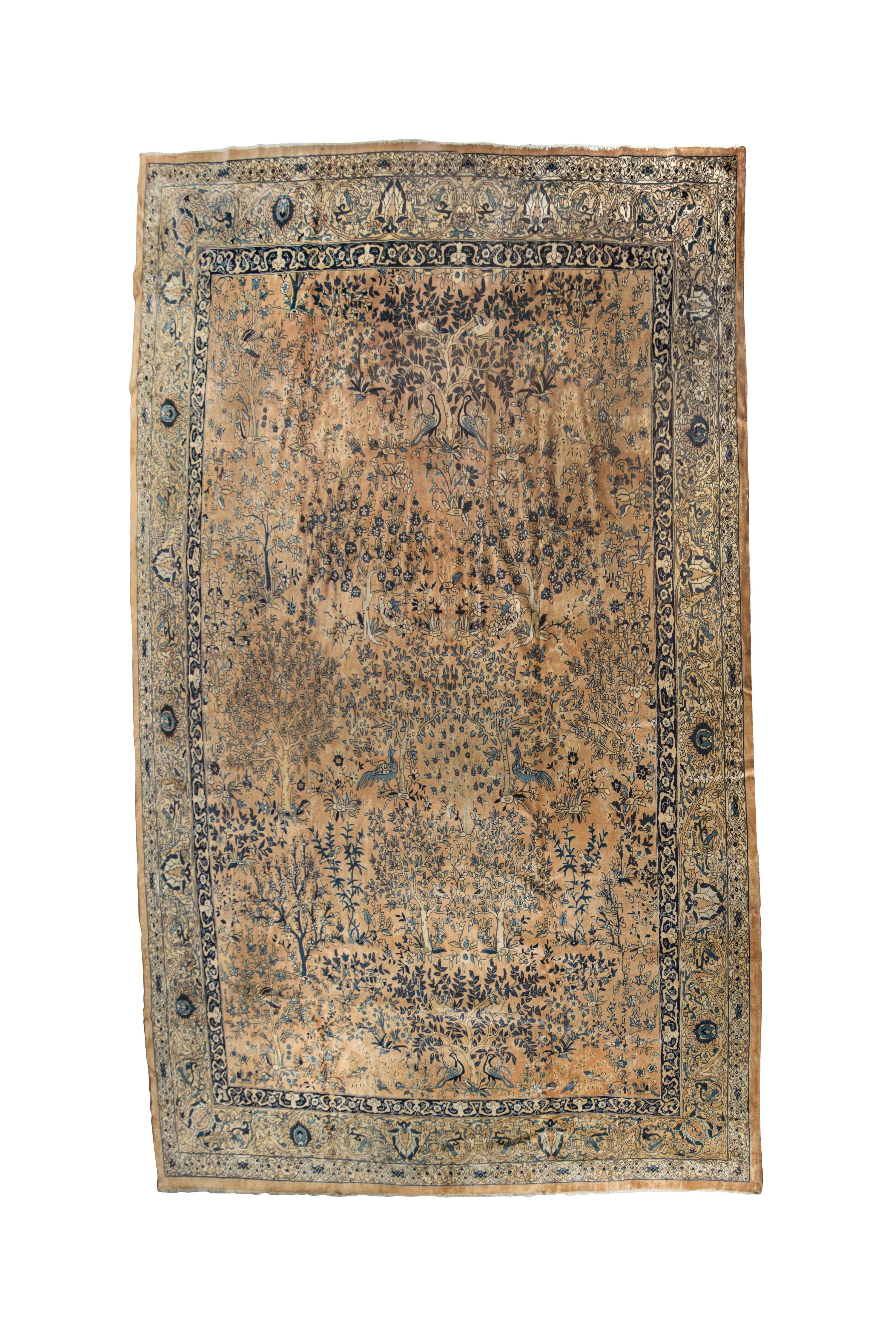 An Indian Wool Rug, CIRCA 1930S, 12 feet 5 inches x 16 feet 5 inches. — CIRCA 1930s