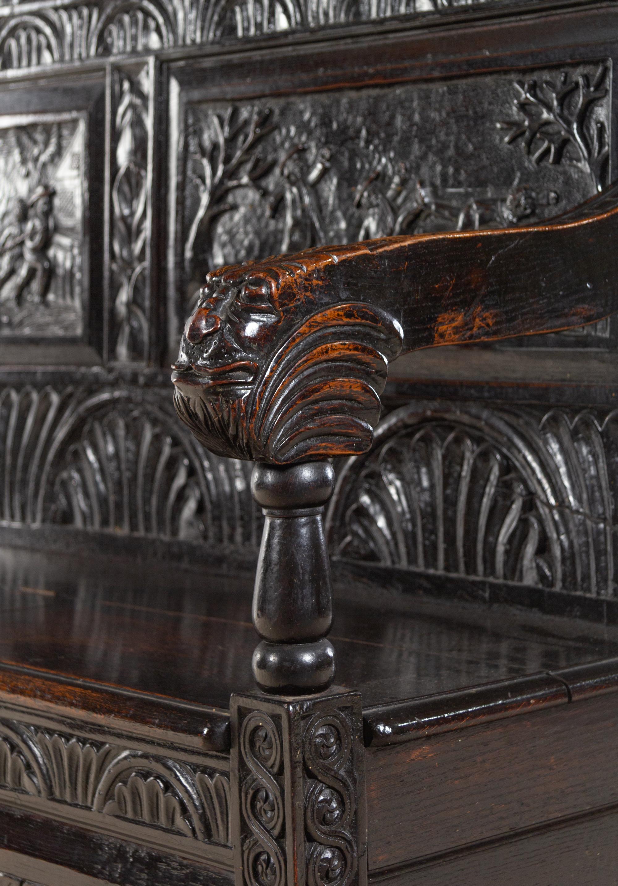 A William and Mary Style Carved Oak Settle