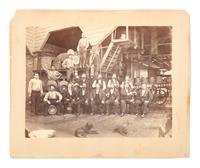 Western Americana -- California Portrait of a group of men from the Royal Canadian Insurance Co. posing with beer steins at the Oakland Brewery. [Oakland, CA]: 1876.