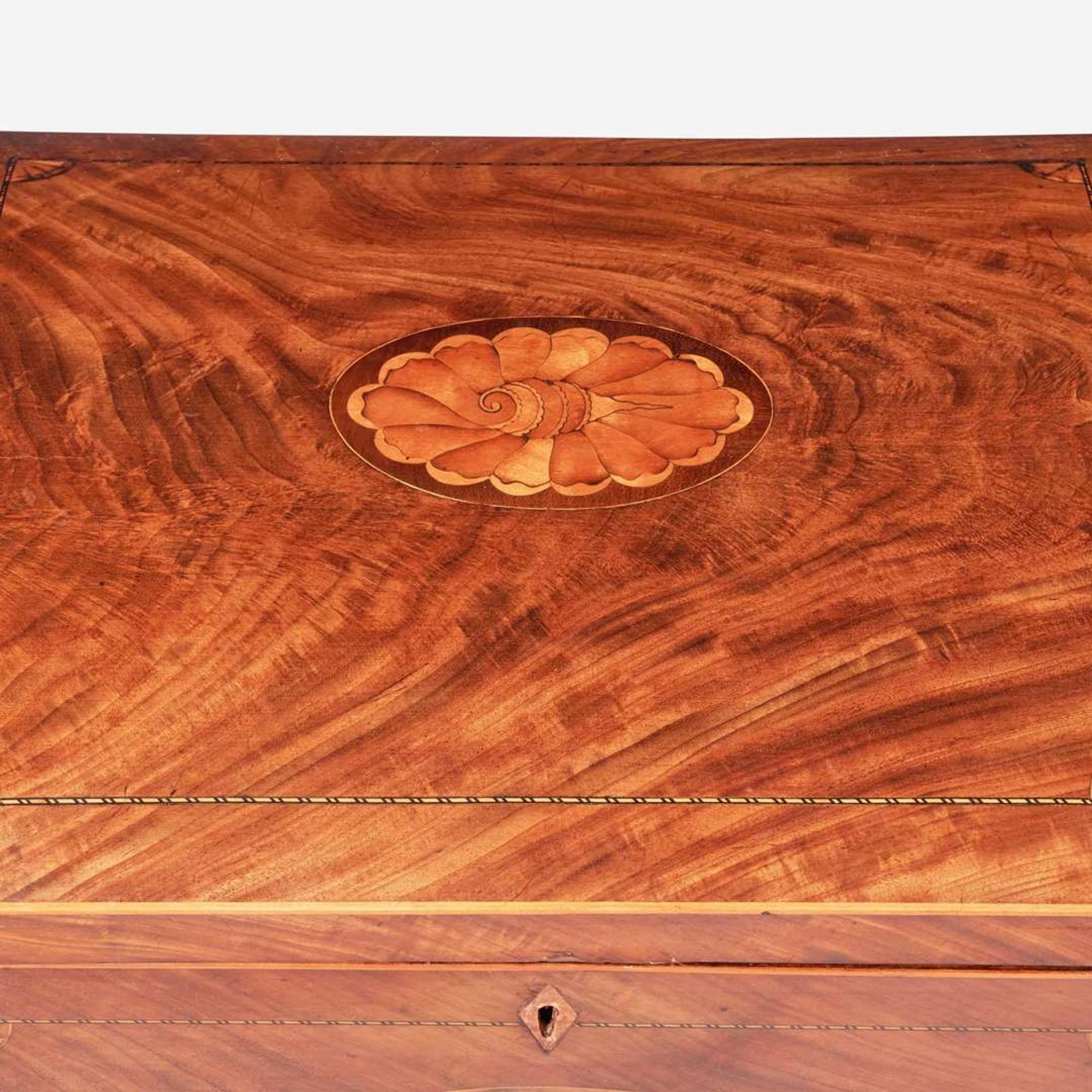 A George III inlaid mahogany and satinwood cellarette circa 1790