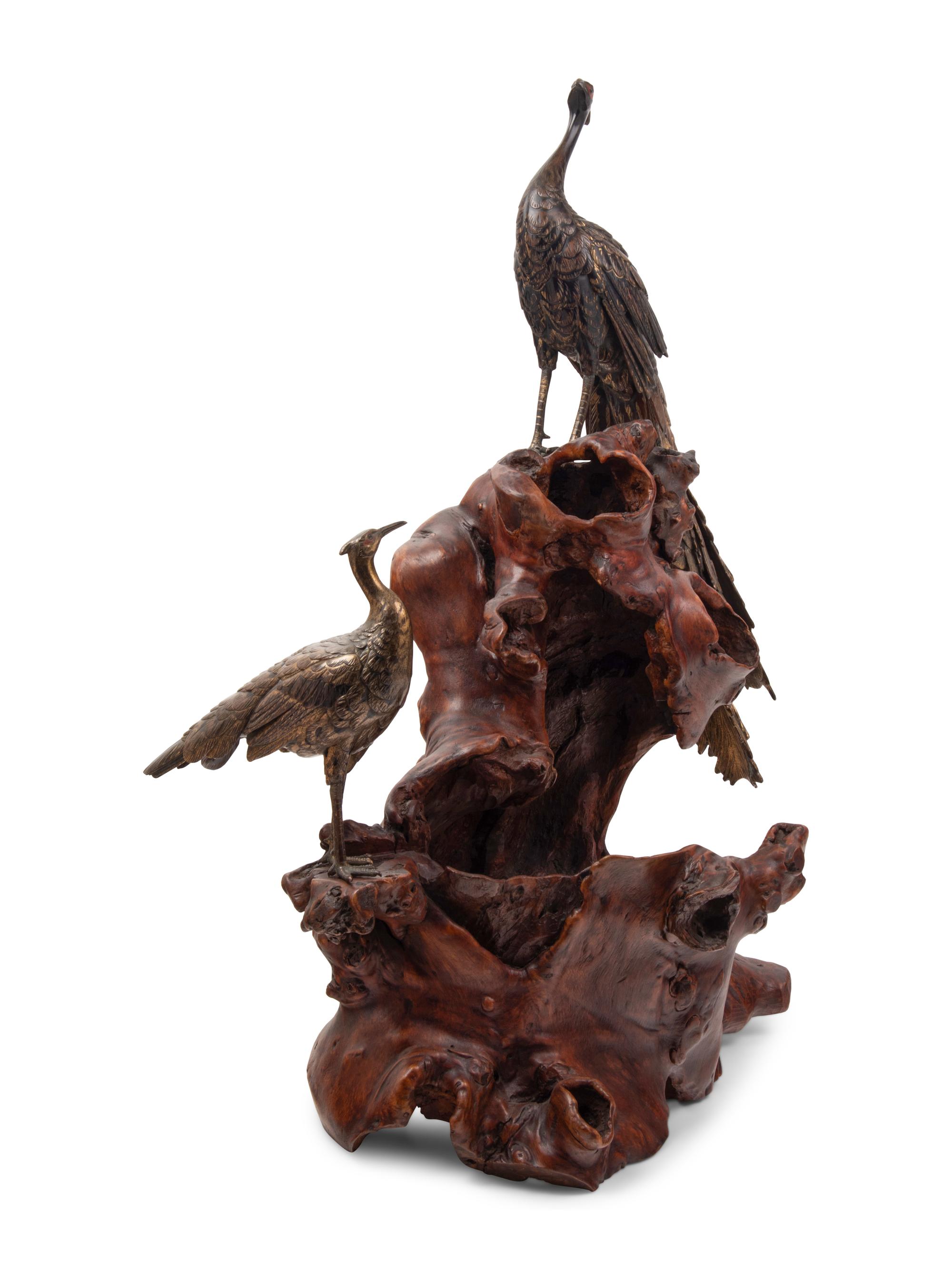 A Bronze Figural Group of Two Peacocks