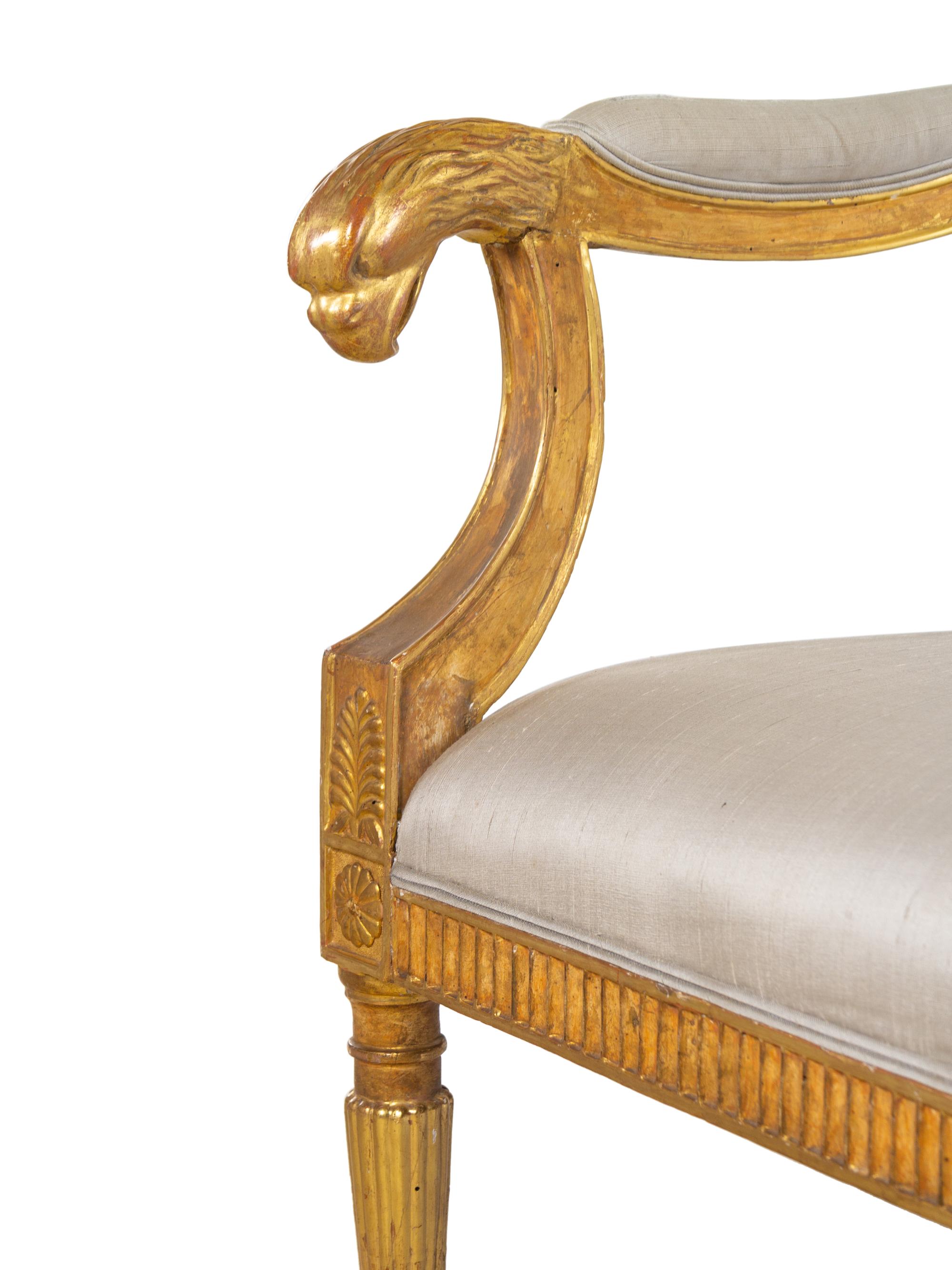 A Pair of Northern Italian Giltwood Sofas with Griffin Supports