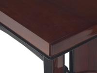 An Art Deco Rosewood and Ebonized Draw-End Dining Table