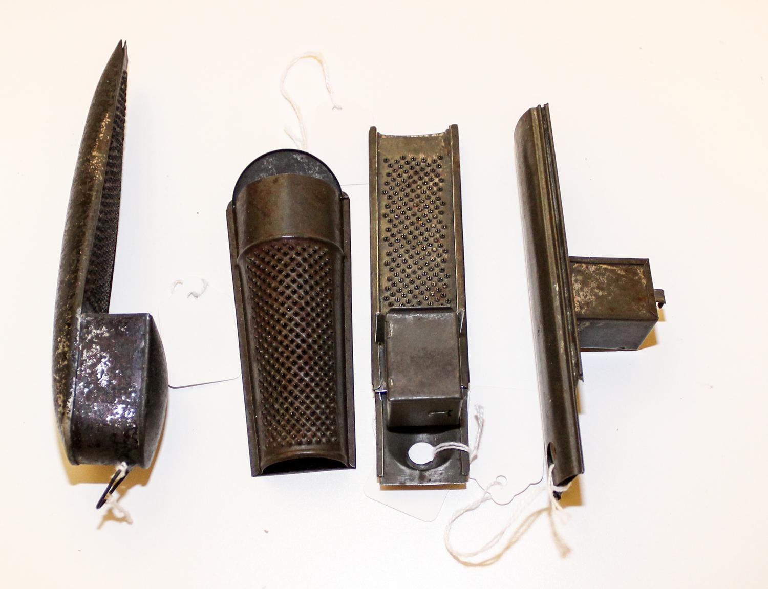 A Collection of Nutmeg Graters Length of longest 7 1/4 inches.
