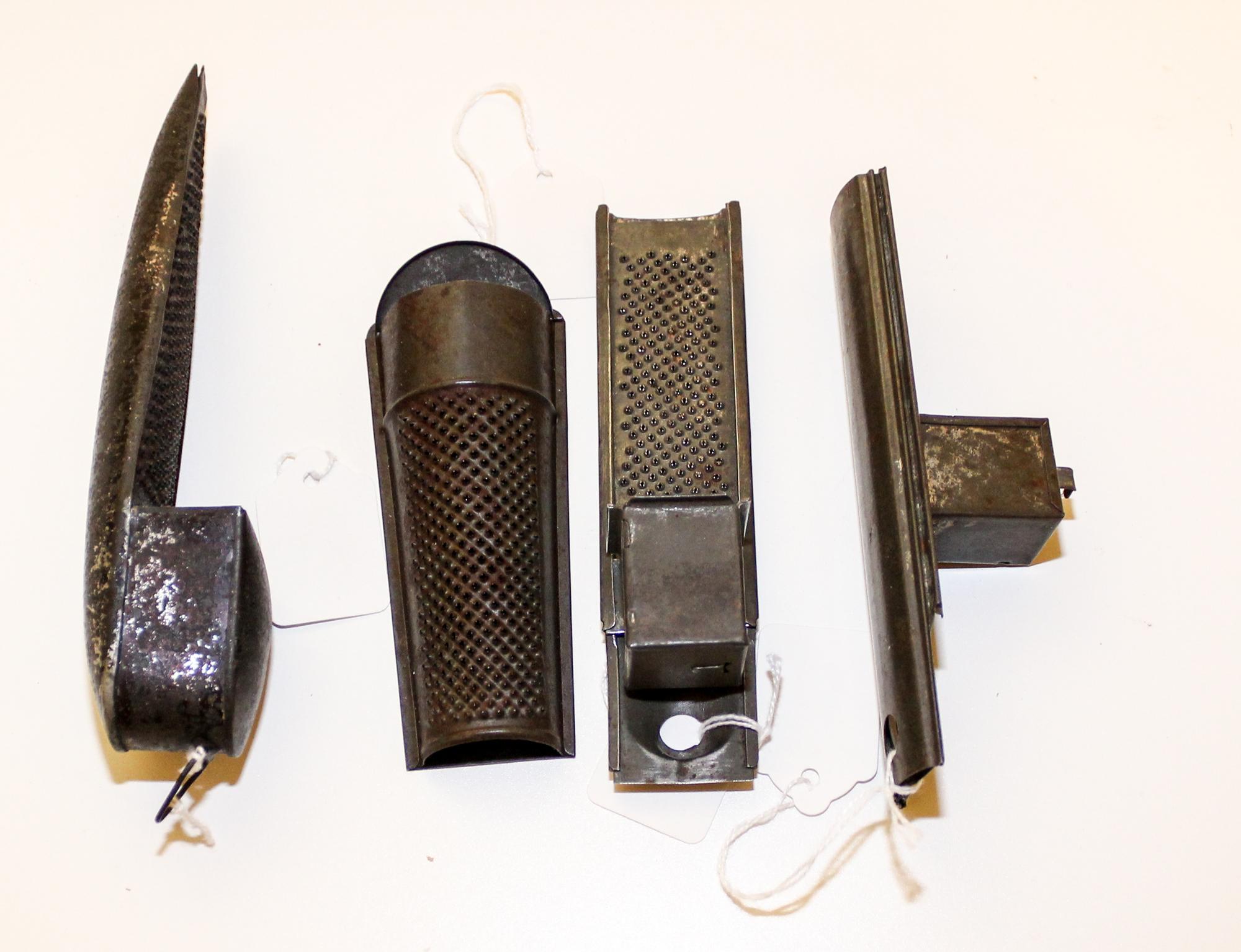 A Collection of Nutmeg Graters Length of longest 7 1/4 inches.