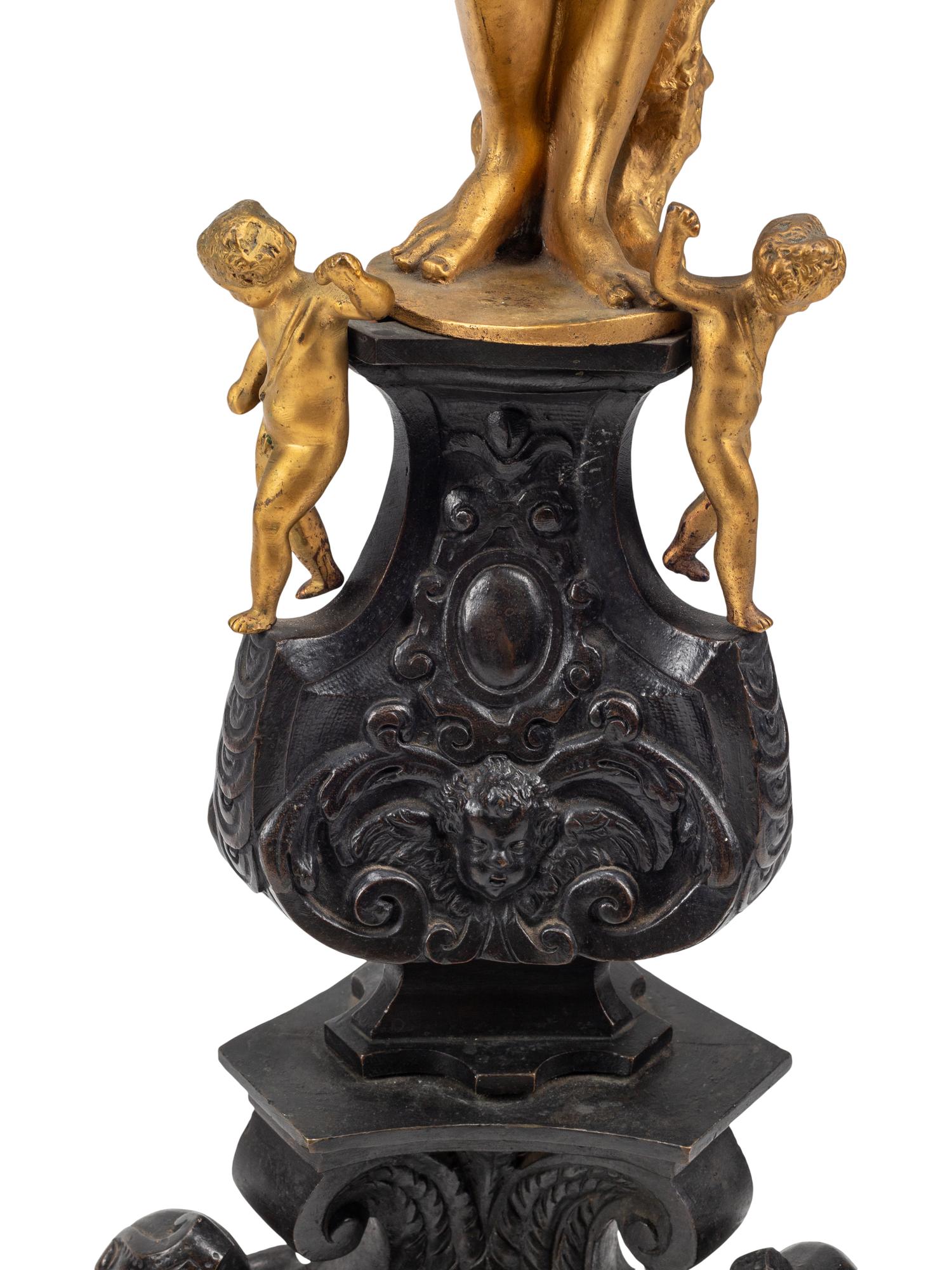 A Pair of Large Baroque Style Gilt and Patinated Bronze Figural Chenets