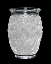 A Lalique Molded and Frosted Glass Vase, Height 6 3/4 inches.