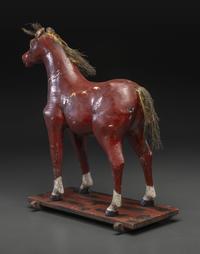 A Carved and Painted Wood Horse Pull Toy