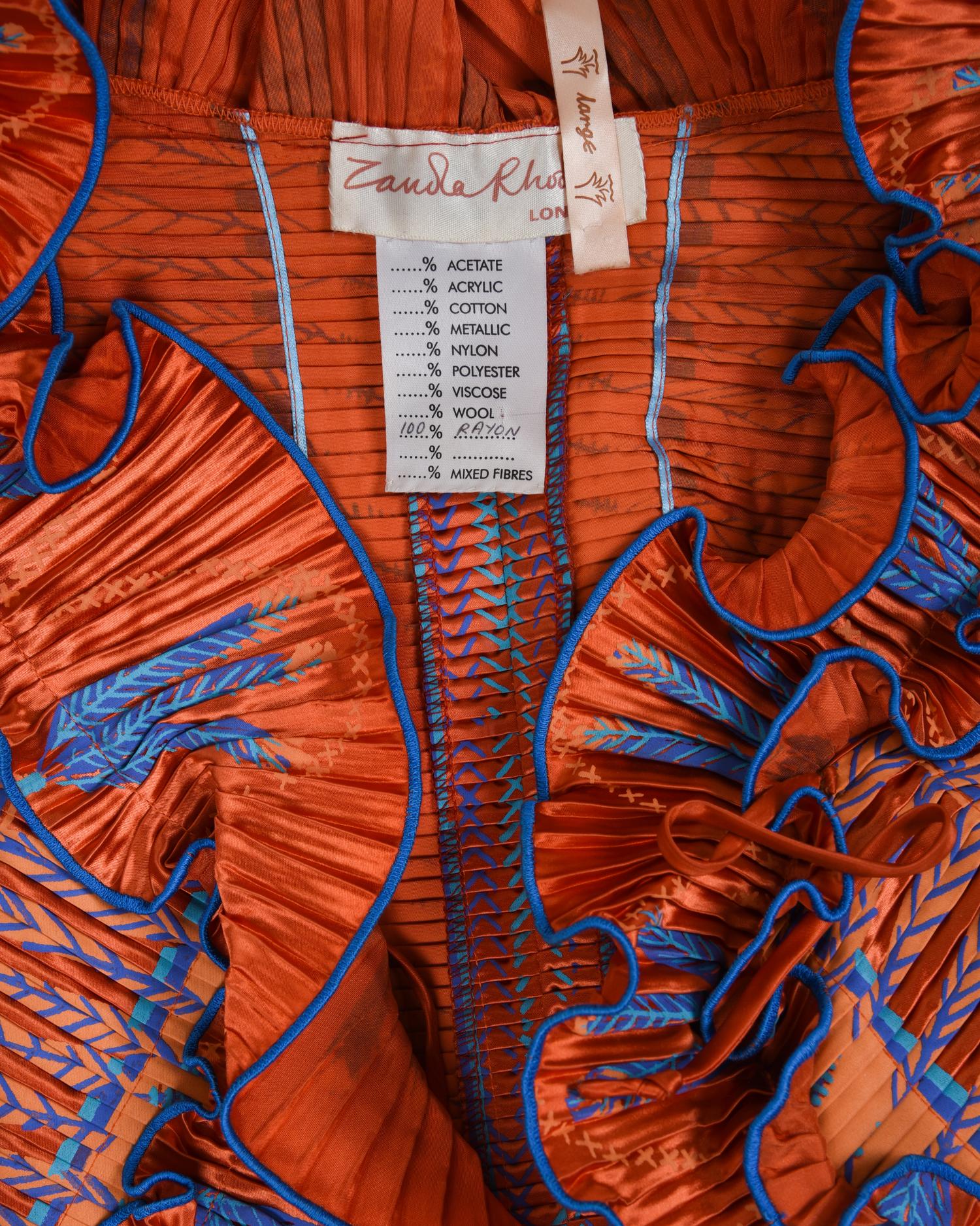 Three Pleated Items: One Zandra Rhodes Bolero and Dress, and One Mary McFadden Dress with Belt, 1980s