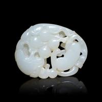 A Chinese White Jade 'Squirrel and Grape' Pendant, 20th Century 近代 白玉鏤雕松鼠葡萄紋珮