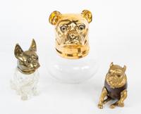 Three Glass and Ceramic Jars with Bulldog Heads