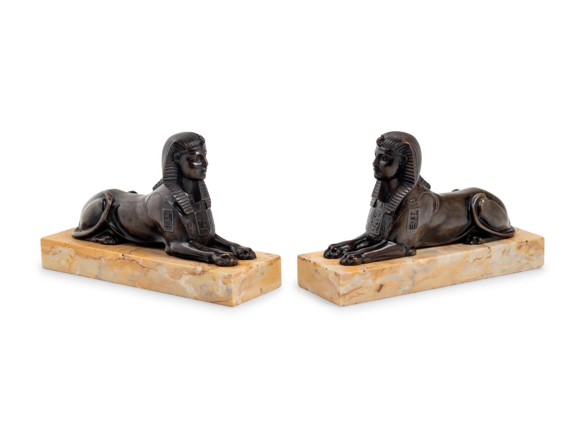 A Pair of Empire Style Cast Bronze Sphinx-Form Bookends