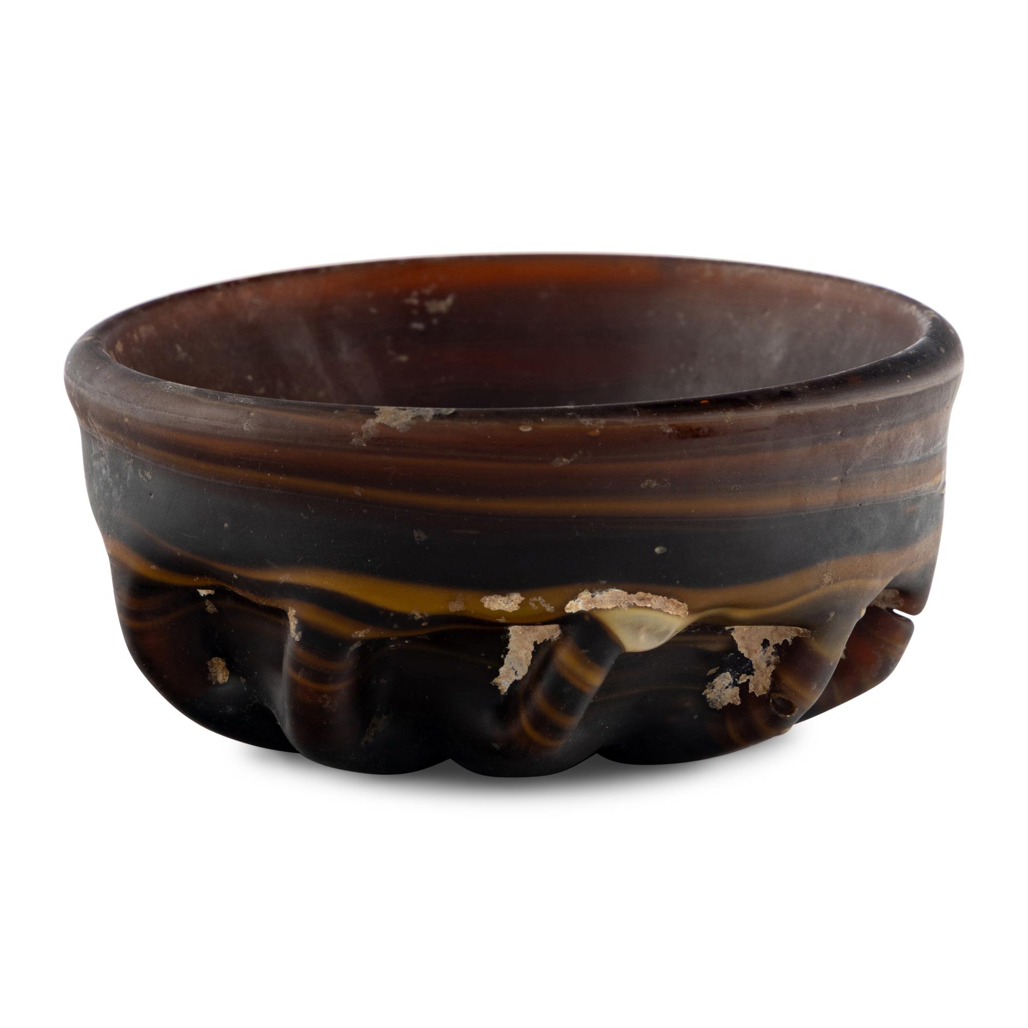 A Byzantine or Islamic Style Amber Glass Bowl