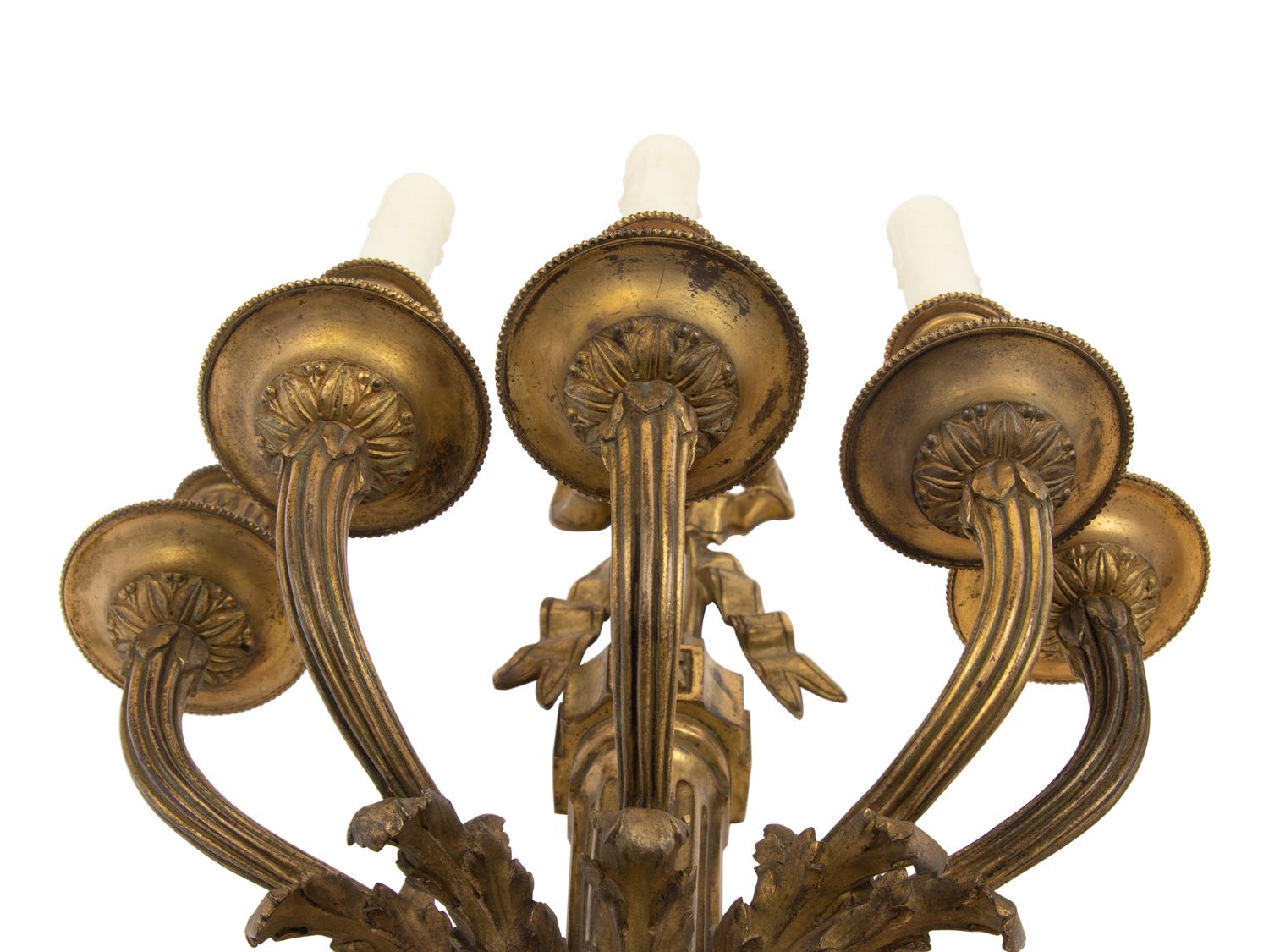 A Pair of Louis XVI Style Gilt Bronze Five-Light Sconces