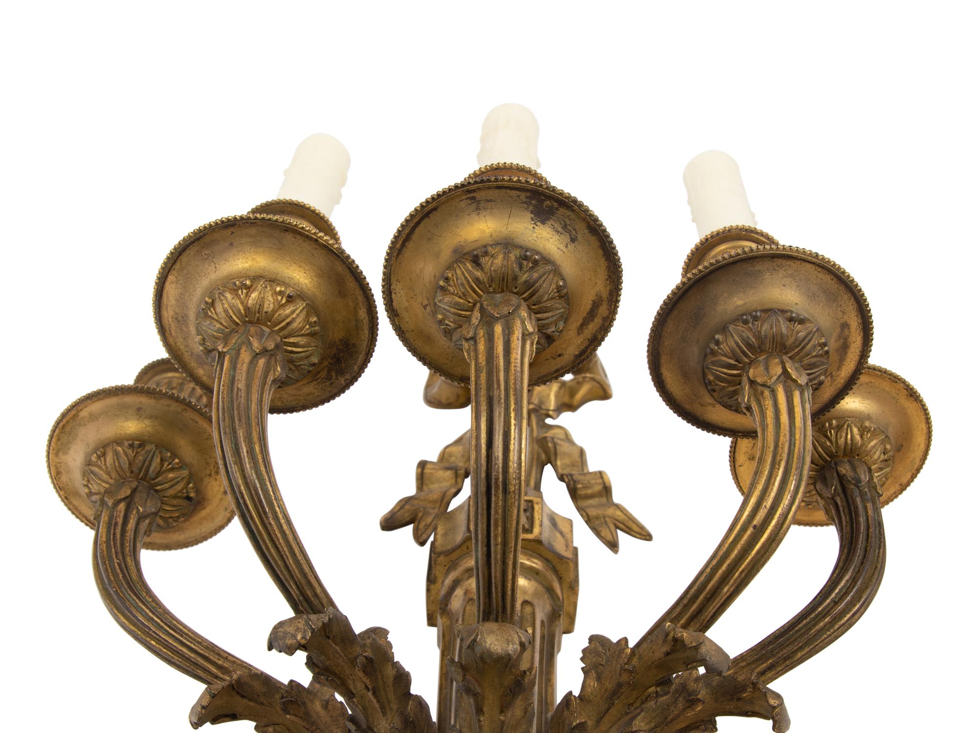 A Pair of Louis XVI Style Gilt Bronze Five-Light Sconces