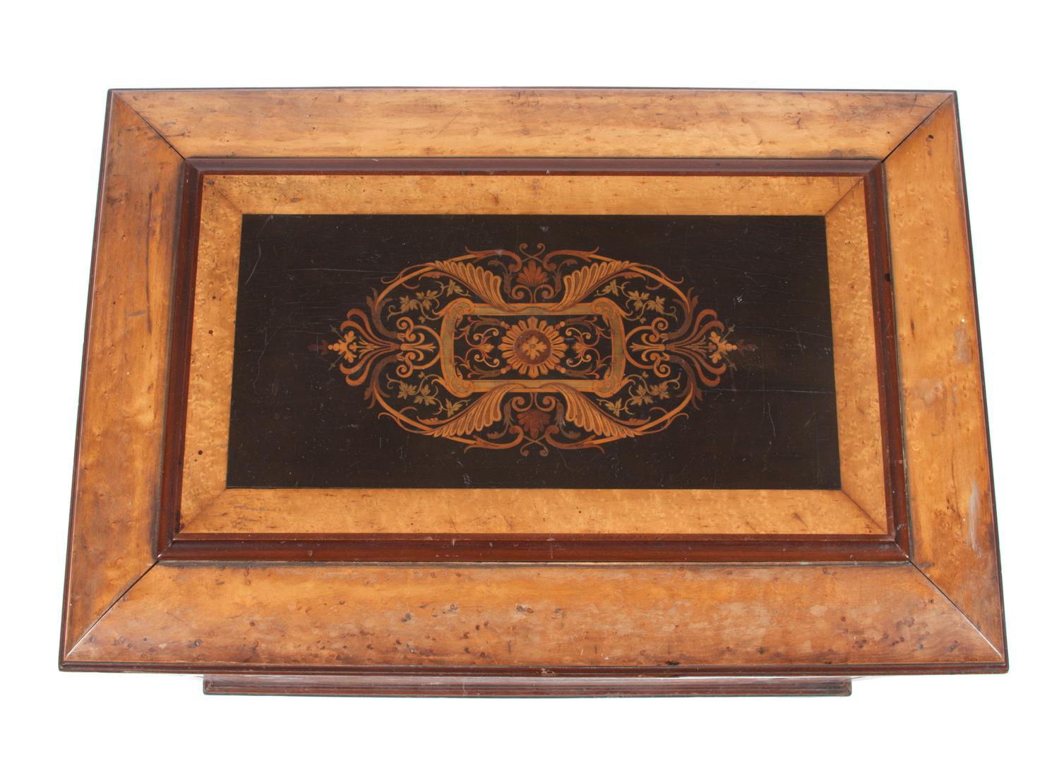 A Bird's-Eye Maple Flatware Chest Height 21 1/2 x width 28 1/2 x depth 19 1/4 inches.
