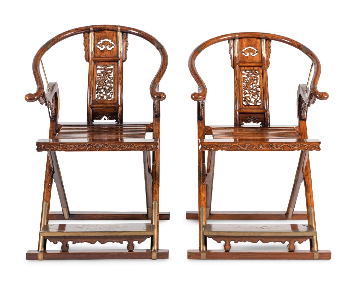 A Pair of Chinese Brass Mounted Hardwood Horseshoe-Back Campaign Chairs