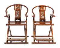 A Pair of Chinese Brass Mounted Hardwood Horseshoe-Back Campaign Chairs
