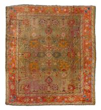 An Oushak Wool Rug