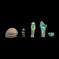 A Group of 5 Egyptian Stone and Faience Amulets
